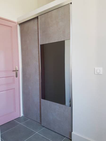 pose porte coulissante miroir central eguilles